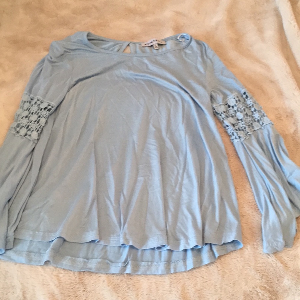 Light blue long sleeved top